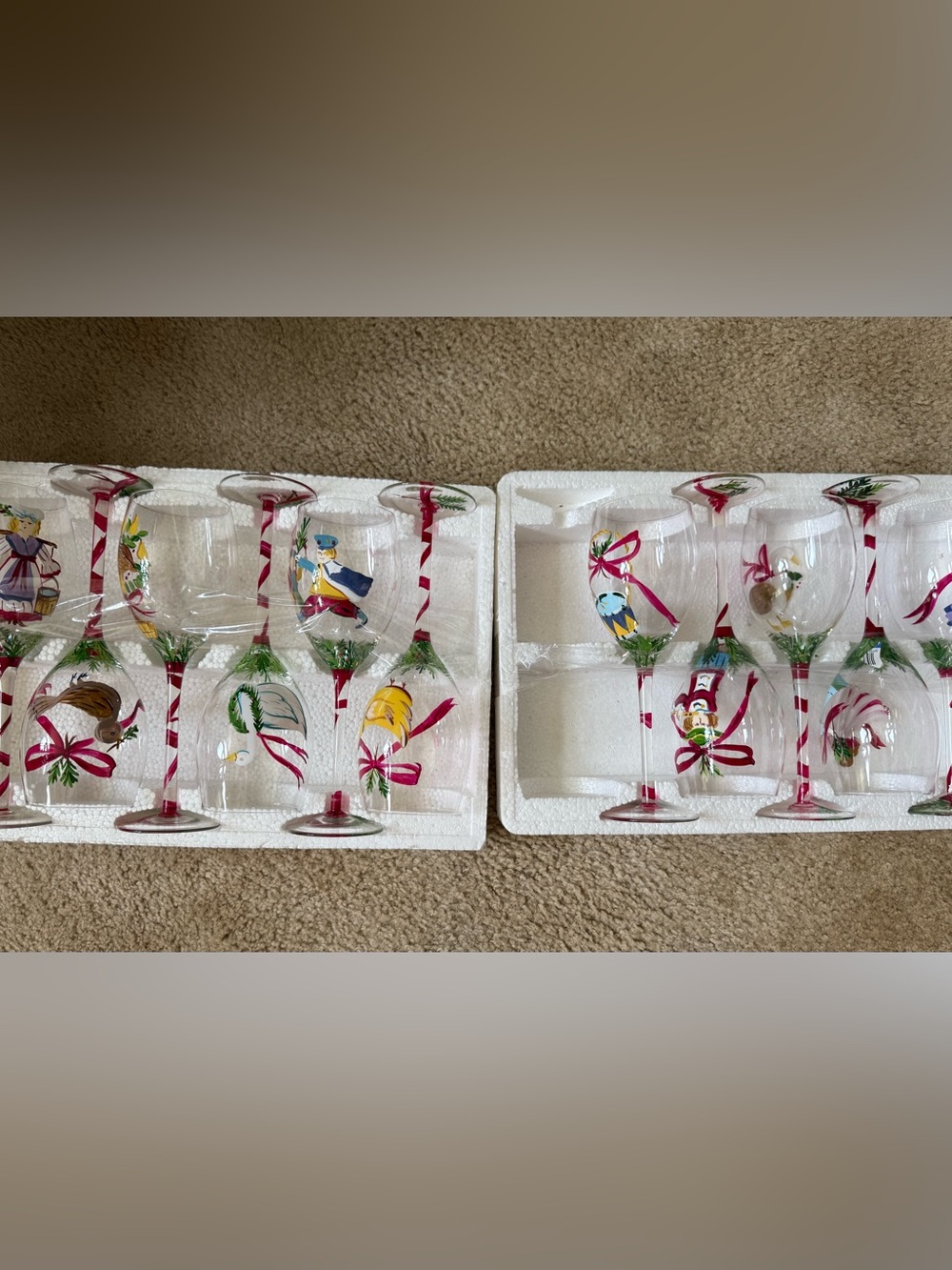 Hand-Painted Holiday Wine Glasses with Festive Ribbon and Pine